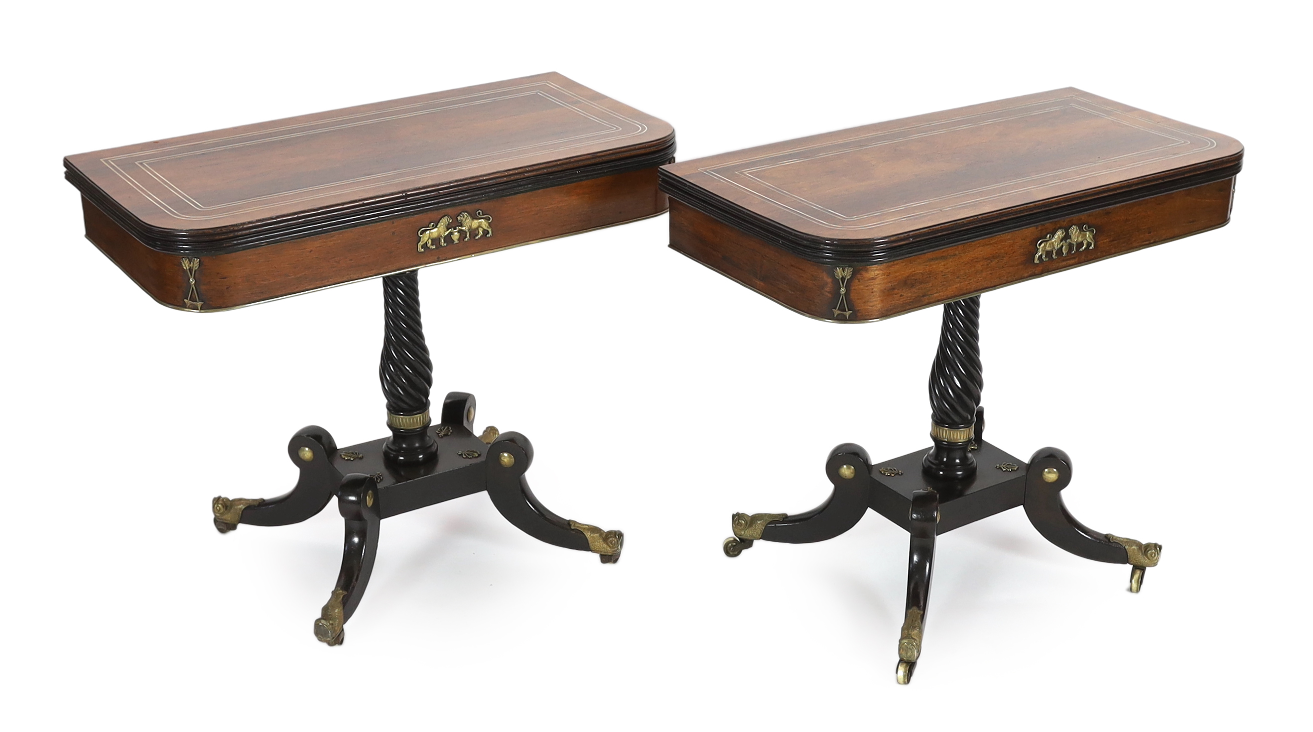 A pair of Regency brass inset rosewood and ebonised card tables 91cm wide, 45cm deep, 75cm high